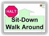 6. HALT   Sit   Down   Walk Around. While heeling forward, the team halts and the dog must sit in heel position.  The handler cues the dog to lie down, gives a wait or stay cue, then walks around the dog to his/her left, and back to heel position.  The handler then cues the dog to heel from the down position and moves toward the next exercise station.